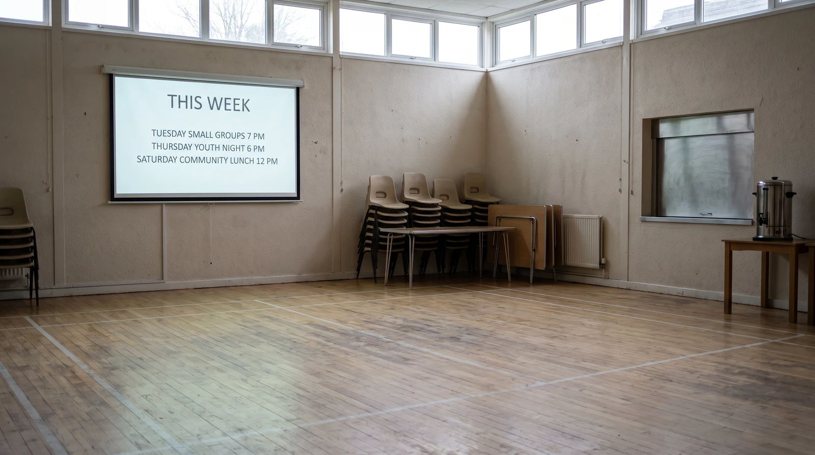 Digital bulletin board showing this week’s notices in a church hall