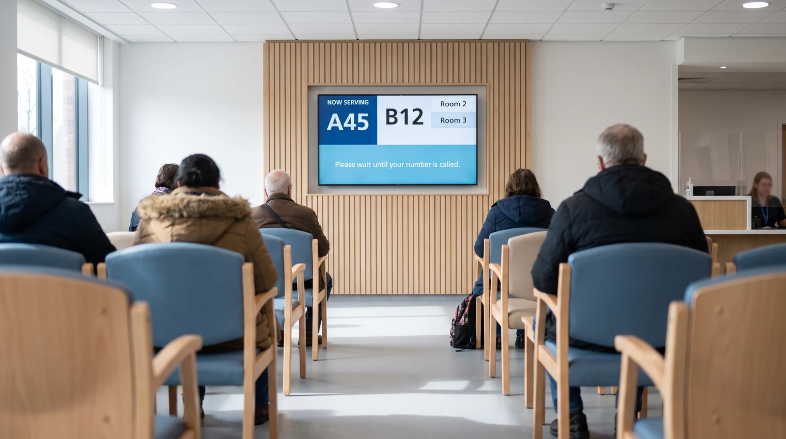 Waiting room screen displaying queue updates and health education content for patients