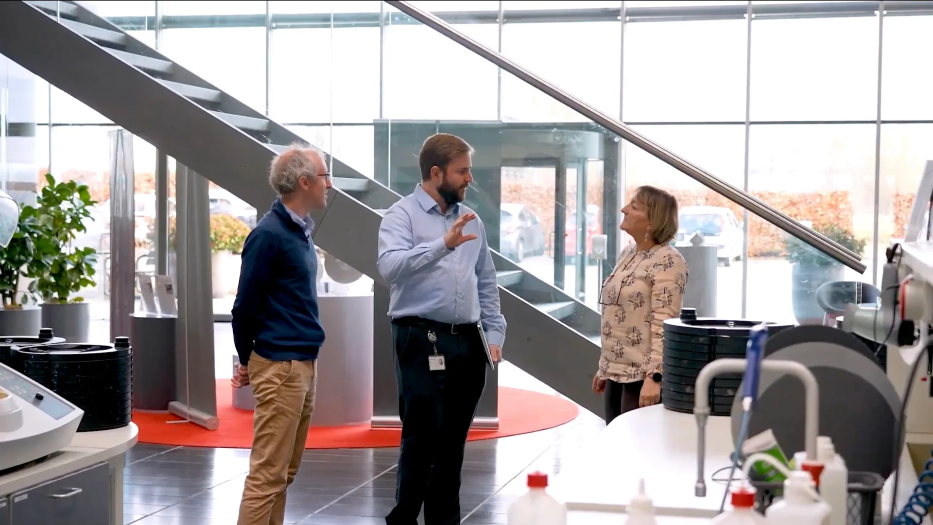 Corporate team working together in a modern open-plan office