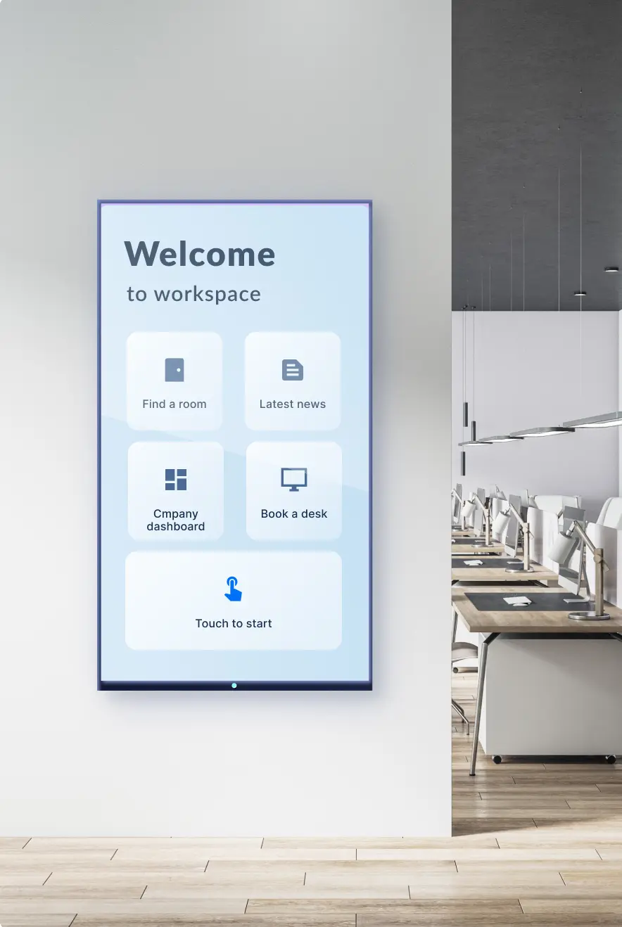 A TV screen in an office setting displays interactive kiosk content giving viewers options to book a room, read the latest company news, access a company dashboard, book a meeting, or find more options.